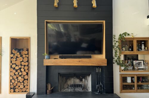 modern fireplace makeover using black shiplap