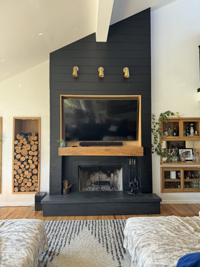 modern fireplace makeover using black shiplap